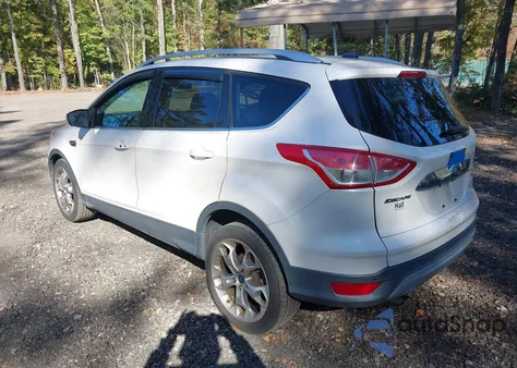 2014 Ford Escape Titanium z USA, uszkodzony, nr VIN 1FMCU0J91EUA74621